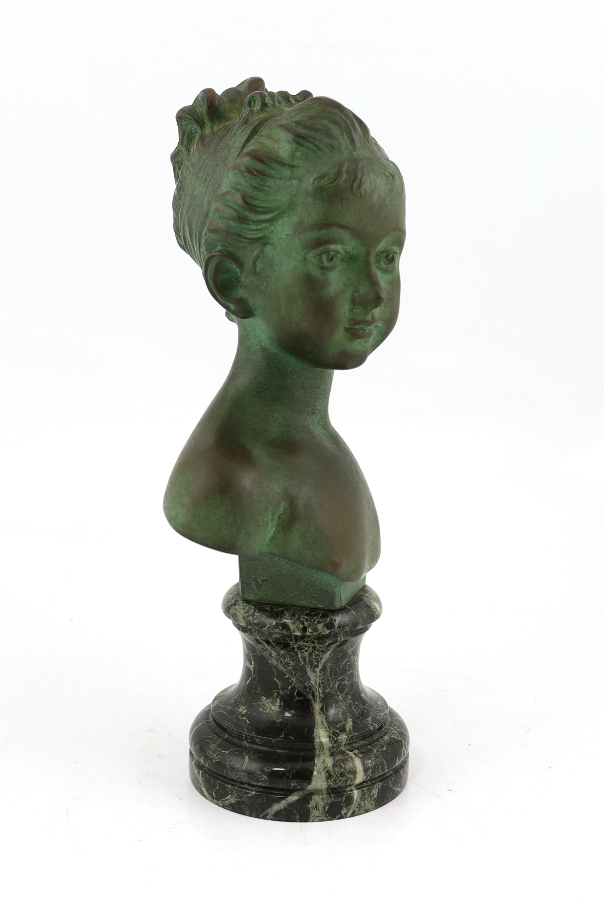 After Jean-Antoine Houdon (1741-1828), a green patinated bronze bust of a child, signed with Patrouilleau éditeur signature in the bronze, on a variegated green marble socle, 35cm high. Condition - good